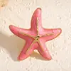 Conjunto de três peças de brinco, anel e broche de estrela-do-mar e concha com estilo oceânico e efeito de gota de óleo, acessórios multicoloridos com bordas douradas vintage estilo férias