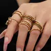 Juego de Anillos Apilables de Zirconia con Diamantes Acero Inoxidable Chapado en Oro de 18K Anillo con Colgante de Candado Pequeño Joyería de Mano para Mujer Estilo Europeo y Americano Venta al por Mayor