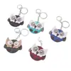 En Stock Pequeño Mini Búho Llavero Colgante de Cuero Búho de Dibujos Animados Alas Giratorias Adorno