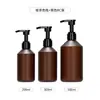 Botella dispensadora con bomba de loción acondicionadora de 300 ml en stock, Botella de empaque para gel de ducha y champú de 500 ml negra esmerilada