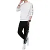 Traje de hombre primavera 2024 nuevo conjunto de suéter de cuello redondo con leggings deportivos casuales traje guapo