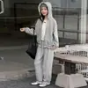 Conjunto de outono para meninas 2026 novo estilo para crianças maiores, moderno e estiloso com moletom com capuz e babados e calça de perna larga