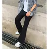 Otoño 2026 Pantalones Vaqueros Occidentales de Color Sólido de Alta Calidad para Hombre Estilo Retro Americano Sencillos Adelgazantes que Alargan las Piernas Micro-Campana de Moda
