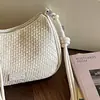 Bolso de axila de nicho de alta gama para mujer, nuevo bolso de hombro con patrón tejido de verano 2026, bolso cruzado tipo albóndiga para el trabajo