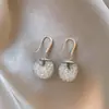 Aretes Huecos Redondos de Circonia para Mujer 2026 Nuevo Estilo Más Vendido Ganchos para Oreja Lujo Ligero Sensación de Gama Alta Joyería para Orejas Joyería para Orejas Súper Bonita