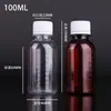 En Stock al por Mayor 50ml 100ml Botellas de Plástico Transparentes Graduadas Botellas Pequeñas para Medicina Botellas dispensadoras de Líquido de Alcohol PET