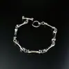 Pulsera minimalista de hueso plateado empalmado, diseño único creativo de nicho, joyería versátil personalizada de alta gama de moda