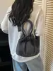 Bolsa de mezclilla estilo japonés para mujer, nuevo modelo 2026, bolsa de cubo artística con cordón, bolso de hombro y cruzado simple y versátil