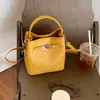 Bolso de mano tipo cesta de verduras transfronteriza para mujer 2026 nuevo bolso versátil de mano nicho para el trabajo diario bolso cruzado elegante bolso tipo cubo