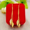 Aretes para mujer de latón chapado en oro con borla de doble línea y hoja, chapados en imitación de oro, puesto de joyería para bodas, suministro para mercados nocturnos