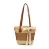 Bolso de Playa de Moda Estilo Vacacional Artístico 2026 Nuevo Bolso de Hombro Único con Bloques de Color Bolso Cruzado de Paja Tejida Casual Tipo Cubo