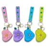 Bolsa de Monedas de Silicona de Dibujos Animados Creativos Bolsa para Auriculares Colgante para Llavero Venta al por Mayor Mini Bolsa Colgante para Llavero