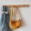 Bolsa Feminina Tendência 2026 Primavera Nova Bolsa de Lona Leve para o Trabalho Bolsa de Ombro Único Transversal Fashionable Bolsa Casual Dumpling