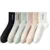 Calcetines de algodón para mujer Langsha primavera y verano malla algodón puro transpirables absorben el sudor calcetines de verano para mujer longitud media hasta la pantorrilla calcetines para mujer