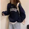 Suéter de longitud media con cuello semi-alto, forro polar, engrosado, para mujer, otoño e invierno, nuevo, holgado, rejuvenecedor, estampado, versátil, que cubre el trasero