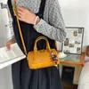 Bolso de Hombro Boston de Mano de Nicho para Mujer 2026 Nueva Moda Casual Bolso Cruzado Tejido Versátil Bolso Almohada