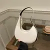 Bolsa de Design de Nicho Feminina Nova Moda Primavera e Verão 2025 Casual Bolsa Lua Crescente de Ombro para Mulheres