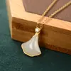 Luxo leve S925 prata de lei jade natural Hetian jade branco jade folha de ginkgo personalidade feminina banhado a ouro conjunto de pingente corrente