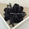 Estilo coreano gasa de nieve anillo para el pelo de intestino grueso cuerda de corbata de lazo retro flor para la cabeza red para el pelo dulce temperamento cuerda de corbata todo partido