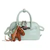 Bolsa de concha de mano de nicho estilo coreano para mujer 2026 Primavera Nueva Elegante Versátil Elegante Lujo Ligero Bolso de Hombro Cruzado Individual