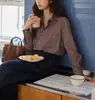 Camisa de manga larga a rayas retro estilo francés para mujer, nueva colección otoño 2026, corte holgado, tejido cepillado