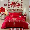 Juego de ropa de cama para boda, con bordado amigable con la piel, un juego de cuatro piezas con un vibrante diseño de dragón y fénix rojo, y tela de algodón de alto recuento, nuevo estilo 2026