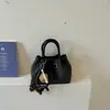 Bolso de mano para mujer transfronterizo 2026 nueva moda coreana pequeño bolso tote versátil para el trabajo hombro bandolera