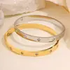 Nova moda europeia e americana estrela trevo de quatro folhas dez diamantes pulseira amantes tudo combina ouro verdadeiro que não desbota pulseira de aço titânio joias