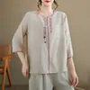 Nuevo conjunto de dos piezas de algodón y lino con bordado retro para madre de mediana edad, verano, holgado, talla grande, adelgazante: top y pantalones de pierna ancha