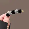 Pinza para el pelo de terciopelo con forma de corazón y perlas, estilo coreano, color block, nuevo modelo otoño e invierno 2026, pinza de pico de pato para frente y laterales