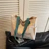 Bolso Tote Simple de Hombro de Gran Capacidad Nuevo 2025 Transfronterizo Bolso de Mano para Estudiante Lona para Viajero Bolso Grande Versátil para Mujer