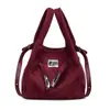 Bolso Cubo Minimalista de Lujo de Nicho Esmerilado para Mujer Otoño 2025 Versátil Casual Europeo y Americano para el Trabajo Bolso de Hombro Cruzado