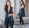Foto real de chaleco de moda talla grande para mujer 2025 nuevo chaleco de mezclilla primavera y otoño nueva chaqueta sin mangas de longitud media
