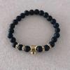 Venta caliente transfronteriza nueva 8 mm piedra negra esmerilada cabeza de leopardo dorada antigua plata cabeza de león pulsera elástica para hombres y mujeres venta al por mayor