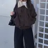 Ropa de mujer, abrigo de algodón de invierno de alta calidad nuevo 2026 estilo holgado con botones de cuerno, de Dongdaemun, Corea