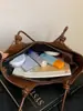 Novedad Otoño 2026 Bolso Tote de Hombro Único de Alto Valor, a la Moda, con Personalidad, Sensación Relajada, para Debajo del Brazo
