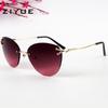 Nuevas Gafas de Sol Ojo de Gato sin Montura Transfronterizas Europeas y Americanas Moda Degradada Océano Gafas de Sol Gafas de Sol Decorativas Personalizadas