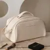 Bolsa de maquillaje de gran capacidad transfronteriza, neceser de viaje, nuevo modelo 2026, bolsa de almacenamiento de cuidado de la piel de alta gama de moda para mujer