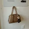 Bolsa feminina vintage transfronteiriça, grande capacidade, nova moda 2026, bolsa de ombro de nicho para o dia a dia, bolsa de braço estilosa