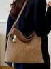 Bolso de mano tejido simple de gran capacidad, nueva moda 2026, bolso de hombro casual de paja para el día a día