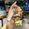 Lindo llavero de Sanrio con colgante de muñeco de dibujos animados para coche, accesorios para bolso, adornos colgantes, pequeño regalo al por mayor