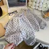 Nuevos estilos de otoño e invierno de pijamas infantiles forrados de forro polar y engrosados, conjuntos de pijamas cálidos unisex estilo coreano con cuello alto