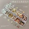 Juego de 12 piezas de lentejuelas de estrella huecas ultradelgadas, polvo de brillo, decoraciones de uñas de pentagrama de PET y accesorios de uñas ponibles