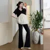 Conjunto de Verano para Maternidad 2026 Estiloso Parche que Reduce la Edad Escote en V Holgado Adelgazante Floral Top + Pantalones de Campana Conjunto de Verano