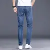Hong Kong 2026 Primavera Nuevos Jeans Rectos Ajustados para Hombre Estilo Coreano Modernos Elásticos de Alta Gama Casual Pantalones Largos para Primavera y Otoño