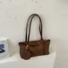 Nova coleção outono/inverno 2026: tecido simples com acabamento fosco, bolsa versátil para o dia a dia, estilo europeu e americano, bolsa de ombro de grande capacidade, bolsa travesseiro, bolsa feminina