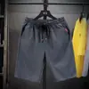Pantalones cortos de seda de hielo de verano para hombre, ropa exterior de talla grande, pantalones deportivos, pantalones casuales de playa, pantalones de comercio exterior