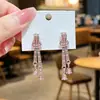Novos Brincos Longos de Luxo Leve com Sensação de Alto Padrão Temperamento Elegante Design de Nicho Modernos Ear Cuffs Nó Pingente de Brinco Gota d'Água