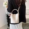 Bolsa pequeña portátil para combinar con todo, bolso de mujer 2024 nuevo, de moda de alta gama, bolso bombonera con textura de estilo occidental, bandolera