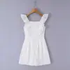 Falda corta abullonada de moda nicho estilo europeo y americano, vestido femenino ajustado que ciñe la cintura, bordado calado con mangas volantes pequeñas